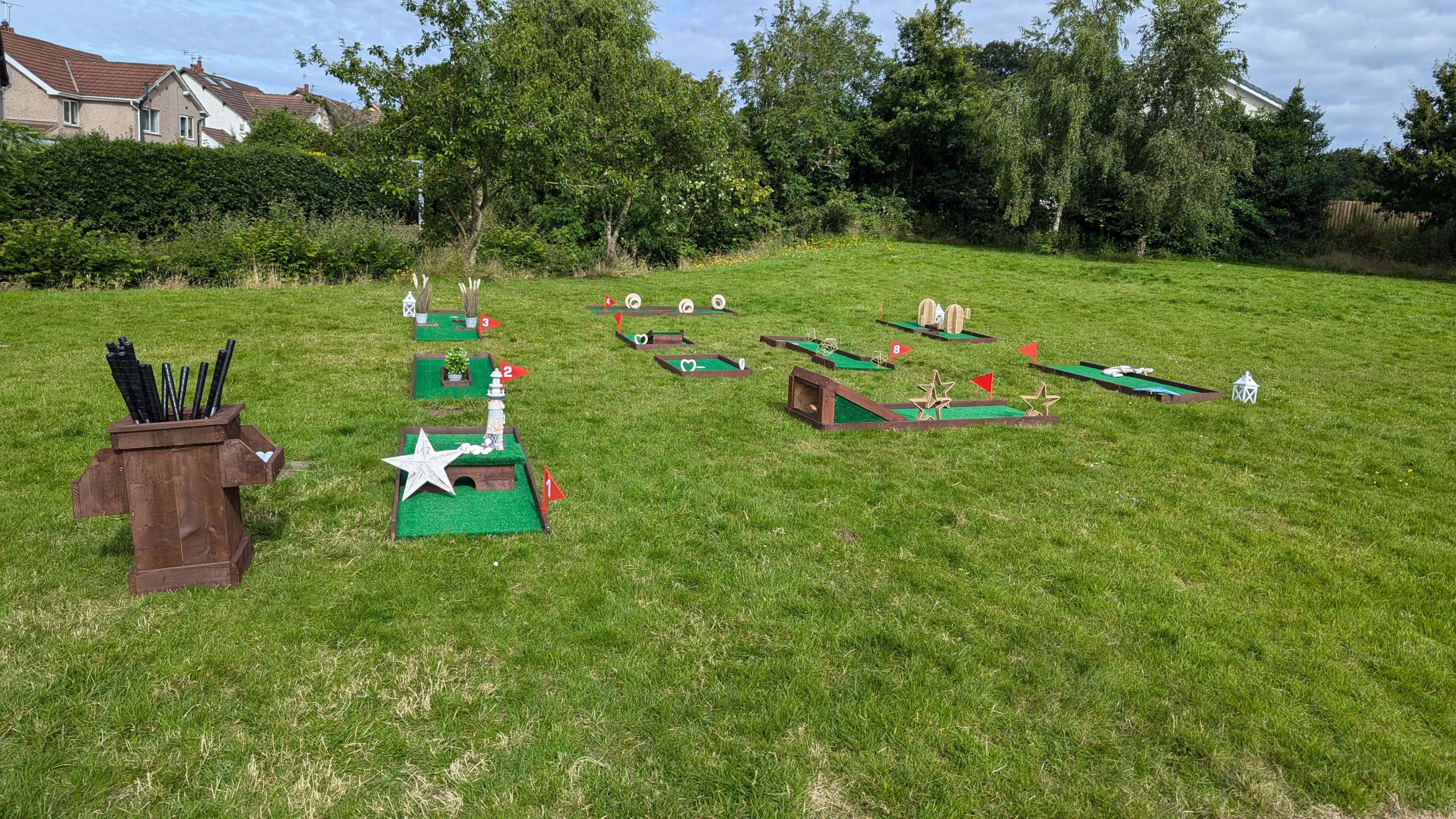A Golf & Play 9-hole course set up on a wedding lawn